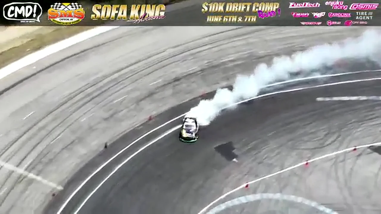 Jonathan Nerren's Nissan 240SX S14 leaving a smoke trail during CMD Round 1 qualifying