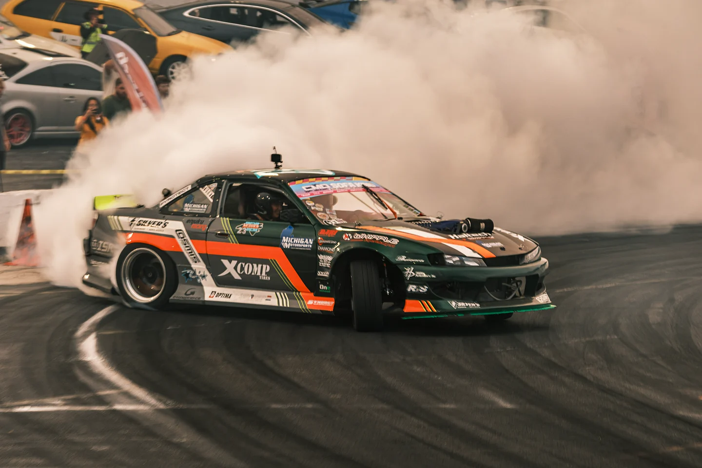 Jonathan Nerren's green and orange Nissan S14 competing at Catch My Drift Round 2